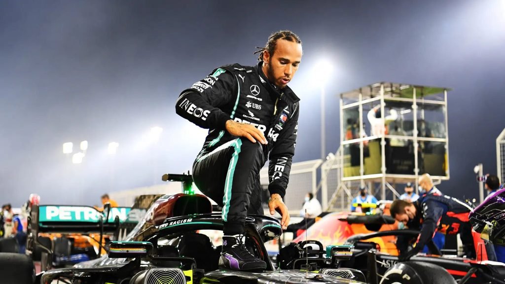 Lewis-Hamilton-climbs-out-of-his-Mercedes-at-the-end-of-the-2020-Bahrain-Grand-Prix