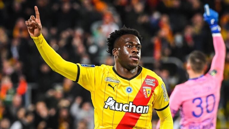 arnaud-kalimuendo-celebrates-after-scoring-lens-goal-against-troyes-in-november-2021