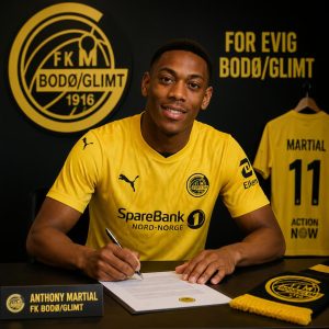 gpt-image-2_creare_an_image_of_Anthony_Martial_signing_a_contract_and_wearing_the_jersey_of_-0